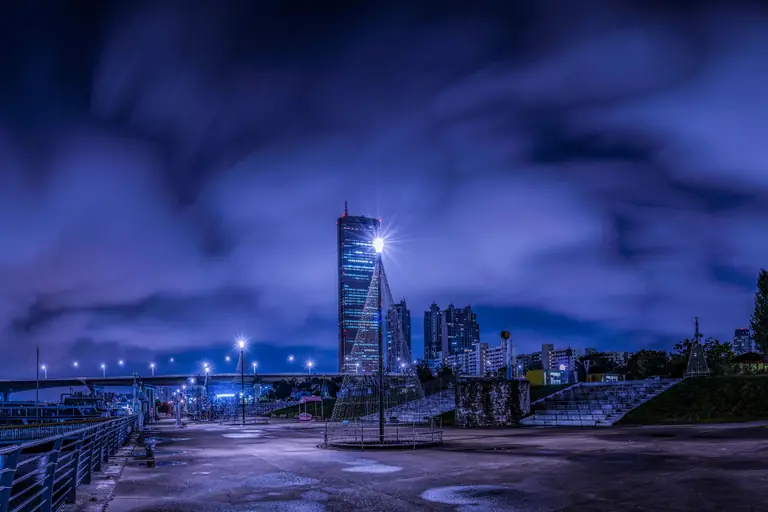 Stunning night view of Seoul's skyline with skyscrapers and illuminated architecture.