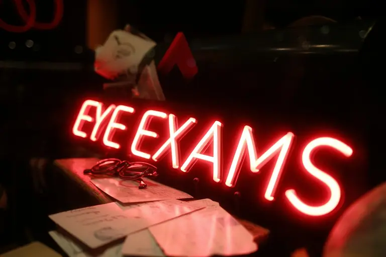 Red neon sign reading