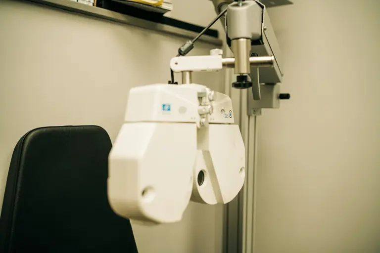 a medical device attached to a wall in a room